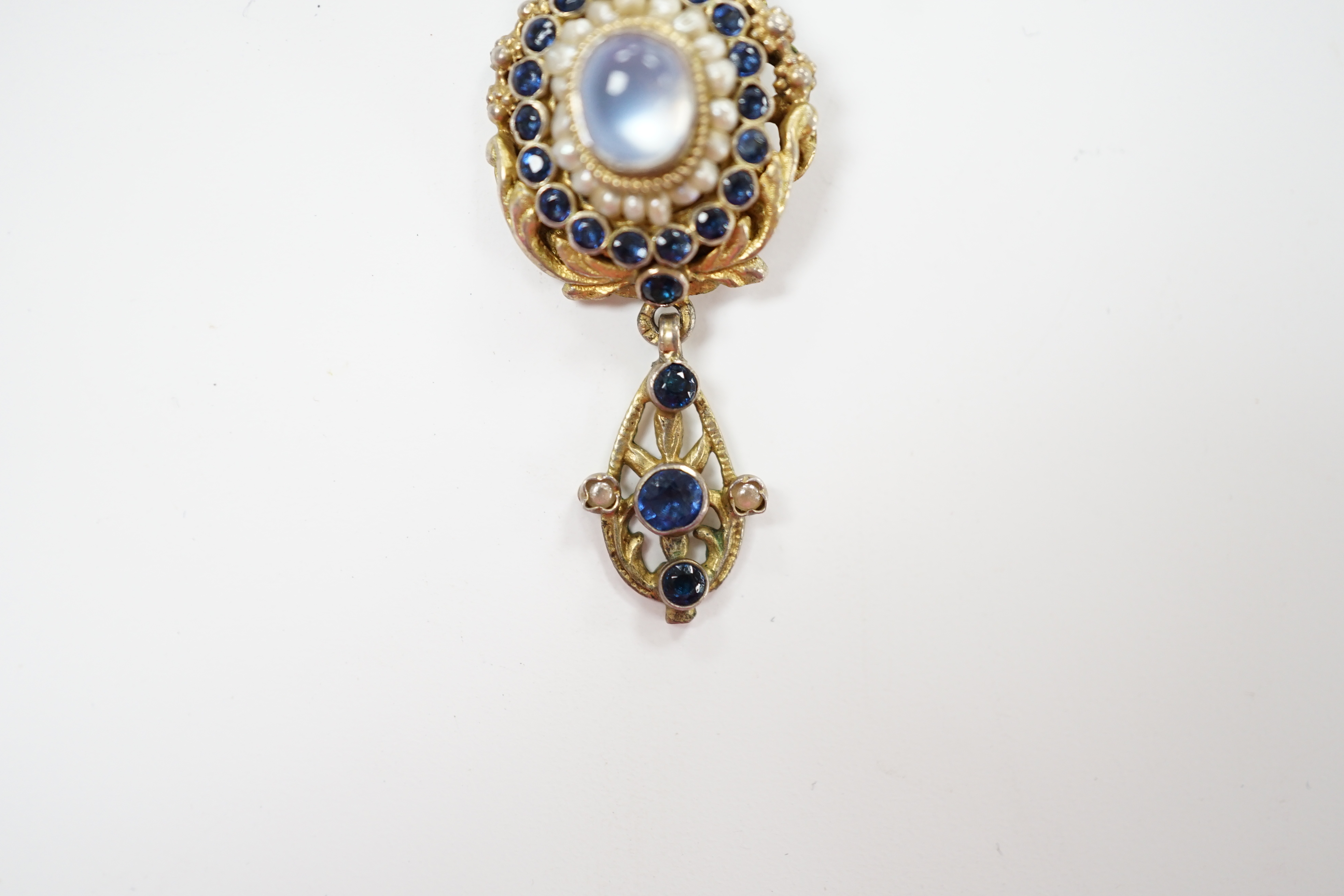 A 19th century Austro Hungarian, gilt white metal, moonstone, split pearl and gem set drop pendant necklace, overall 56cm.